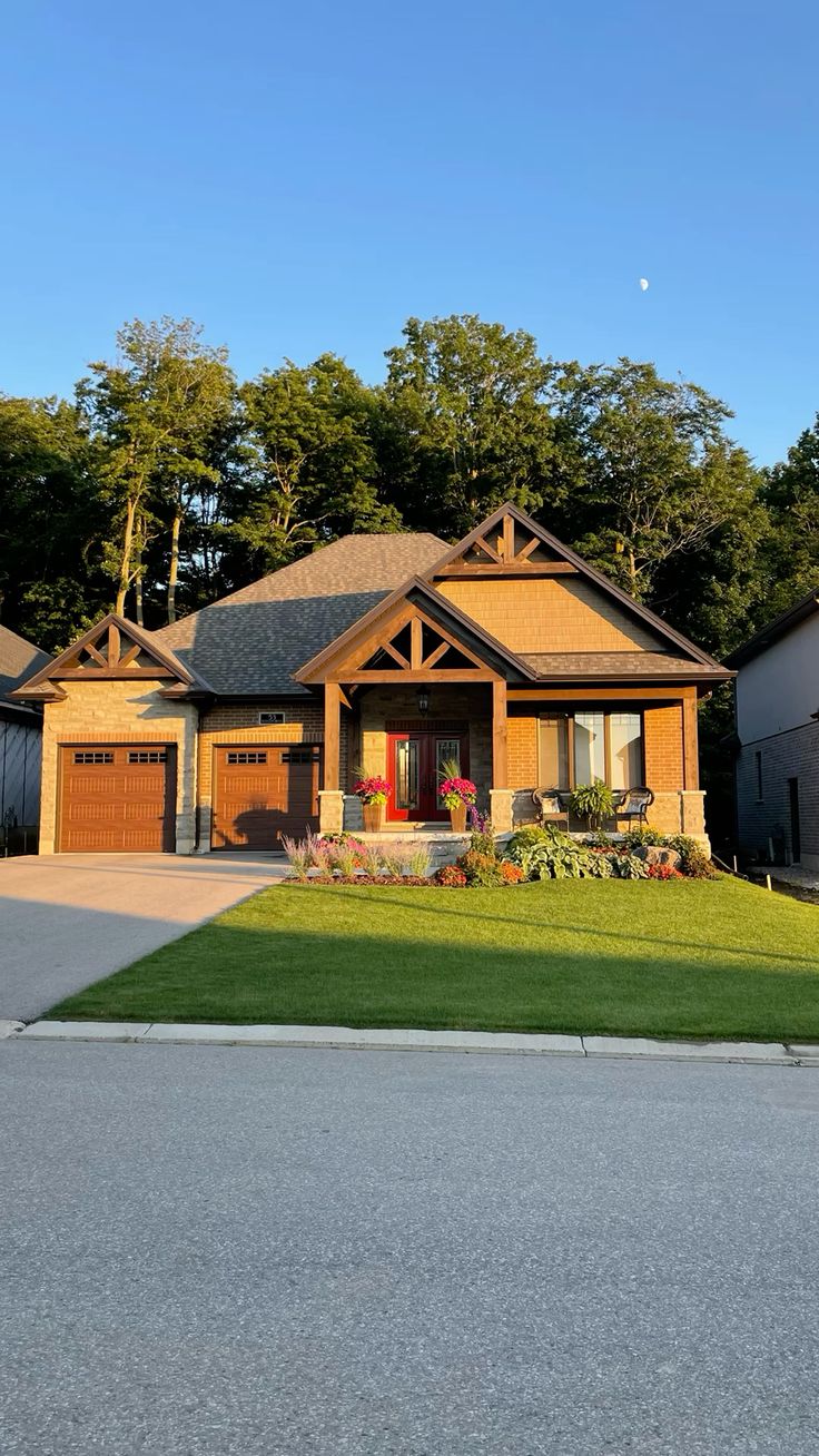 11227 W Belleview Ave, Littleton, CO — Craftsman-style home with warm wood trim and a covered front porch