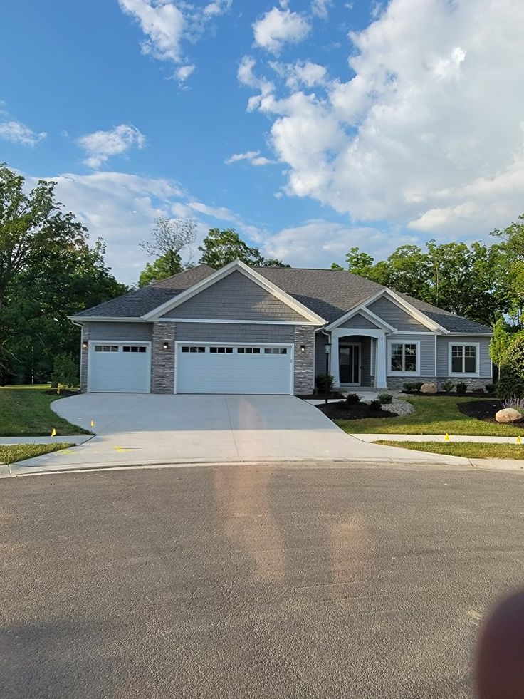 22050 E Ottawa Cir, Aurora, CO — Spacious home with stone columns and a double garage